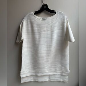 Saks white ribbed shirt. Boxy cut, short sleeves.